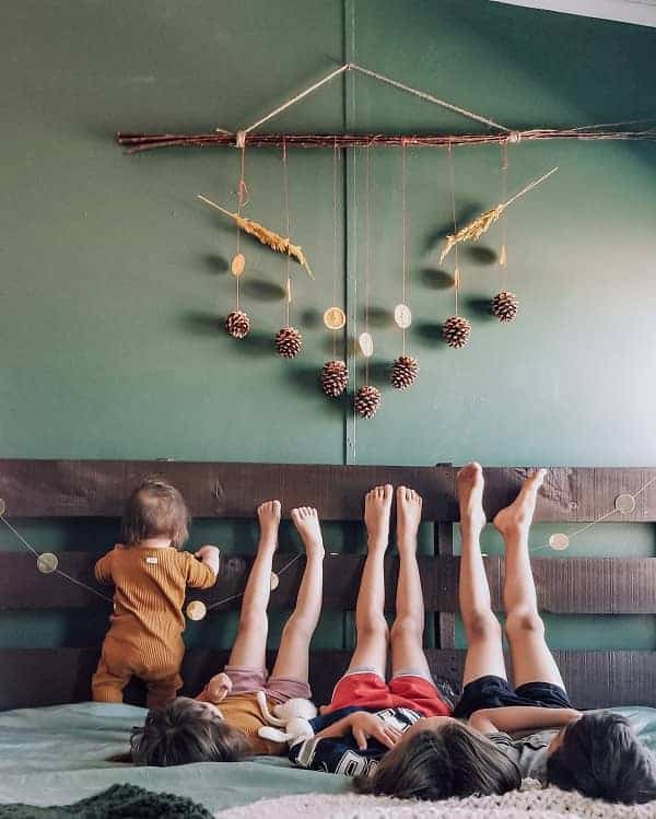 kids underneath wall art