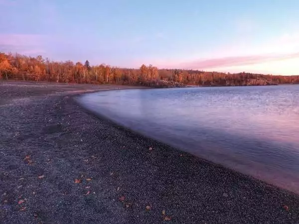 Stunning black sand beach in Silver Bay