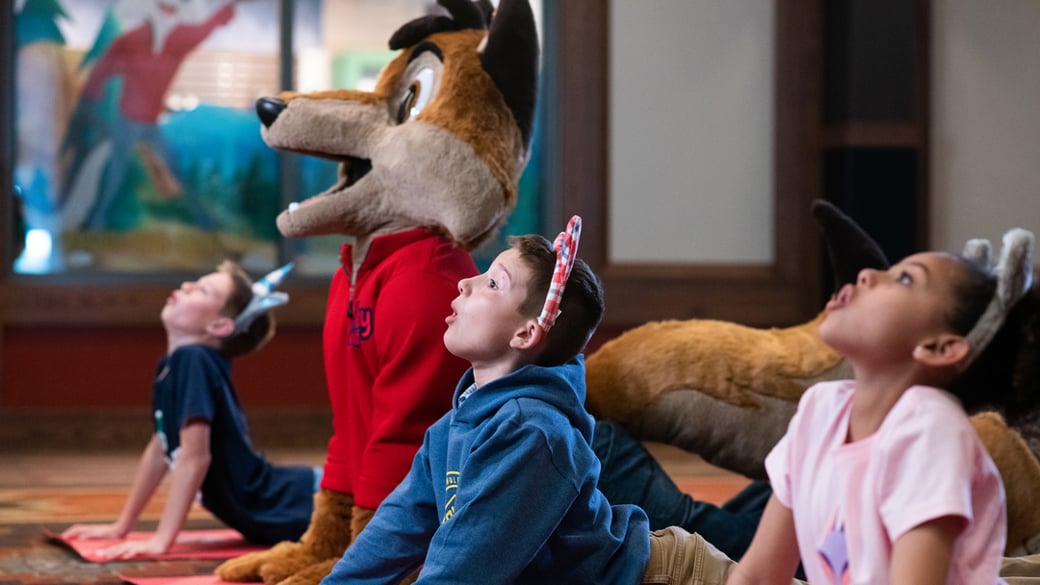 kids doing yoga with Wiley