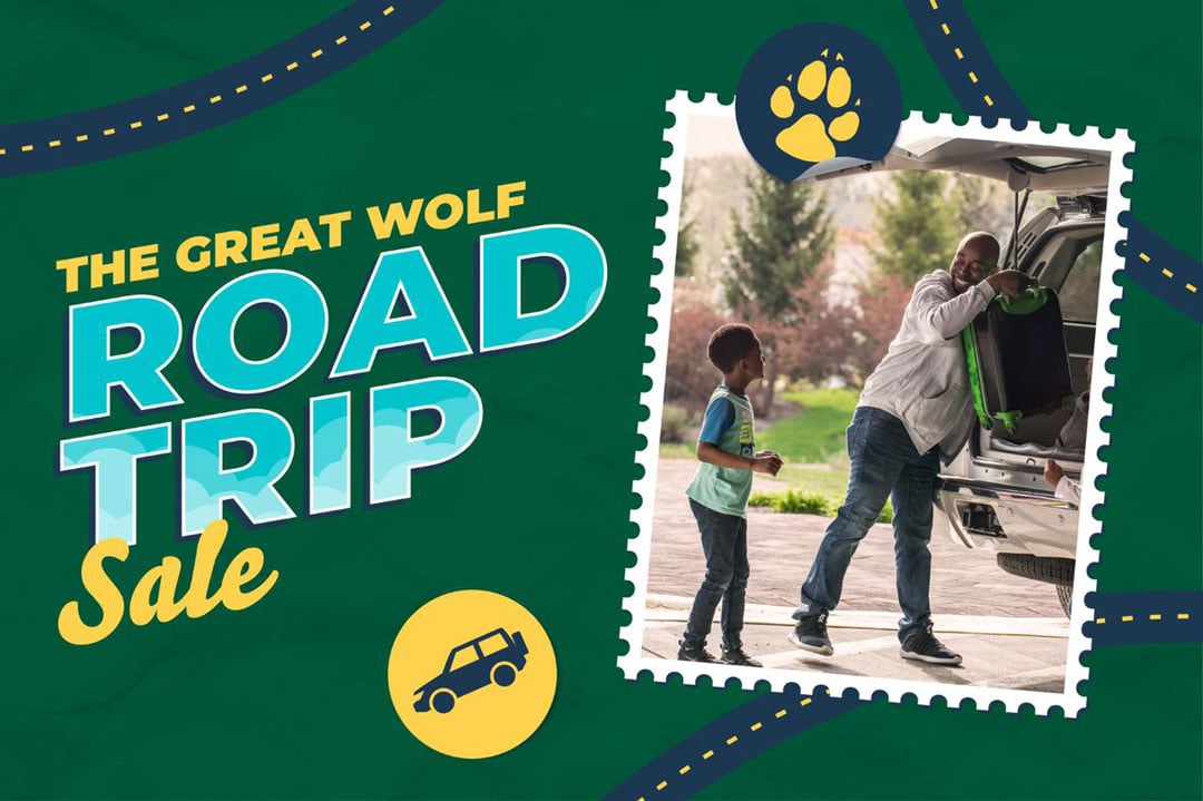 Father helping taking bags out of a car after arriving at Great Wolf Lodge