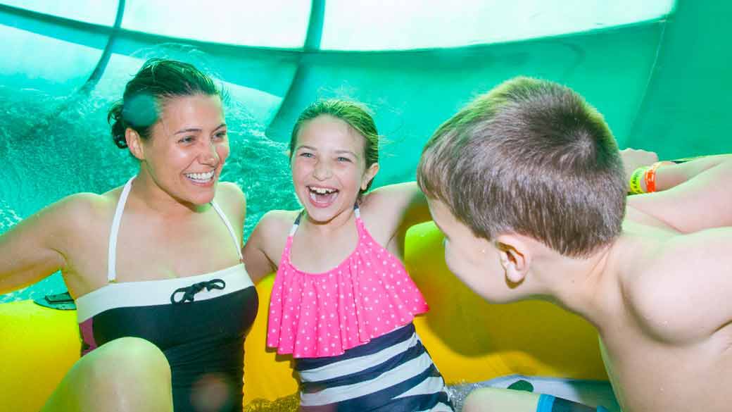 family enjoying indoor water park at Great Wolf Lodge