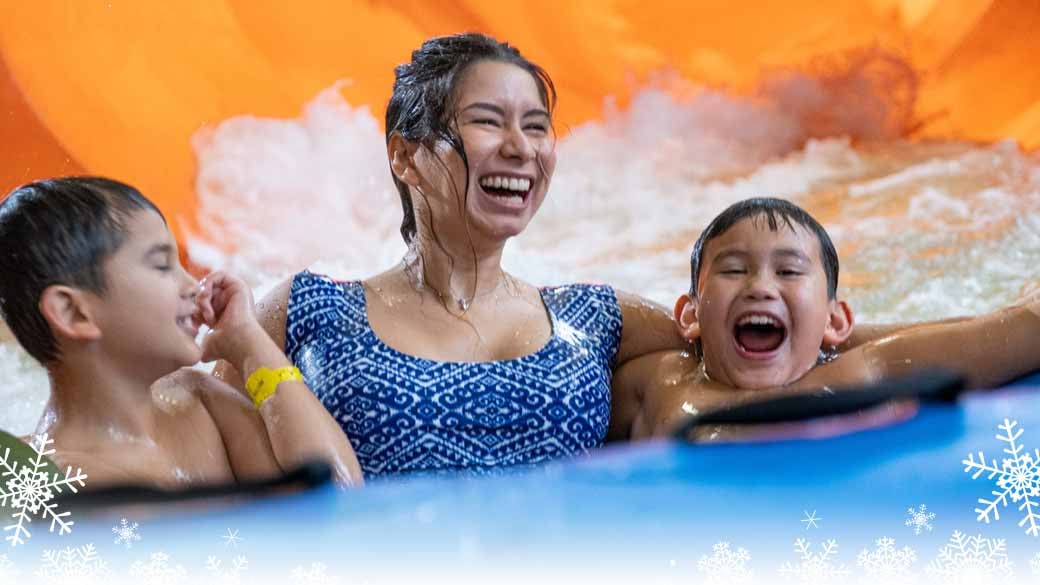 Mother and son enjoying an indoor water park at Great Wolf 