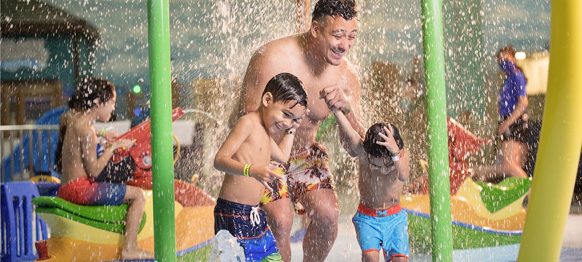 father and son in the water park