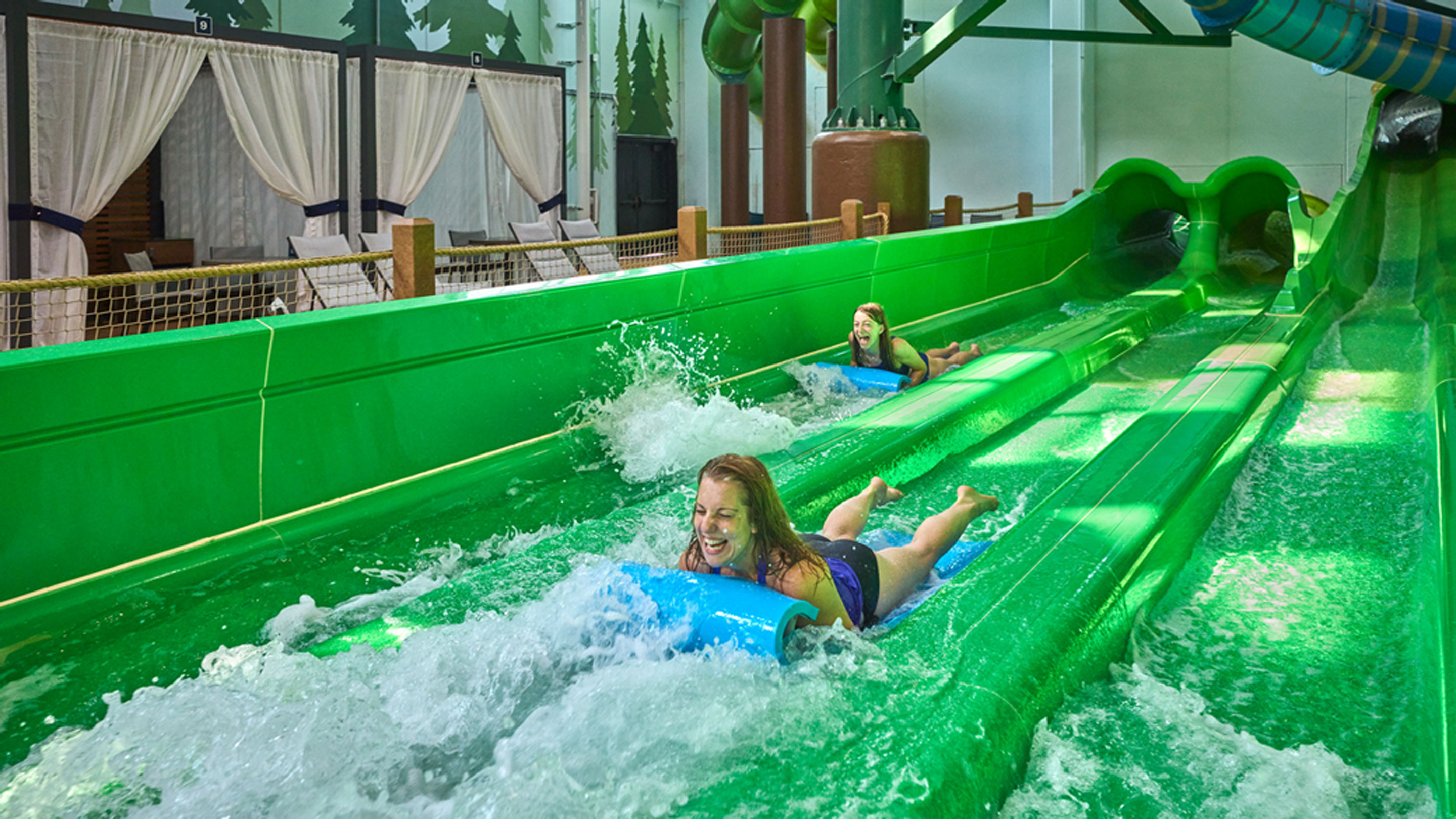 Kids enjoying fun indoor water slides