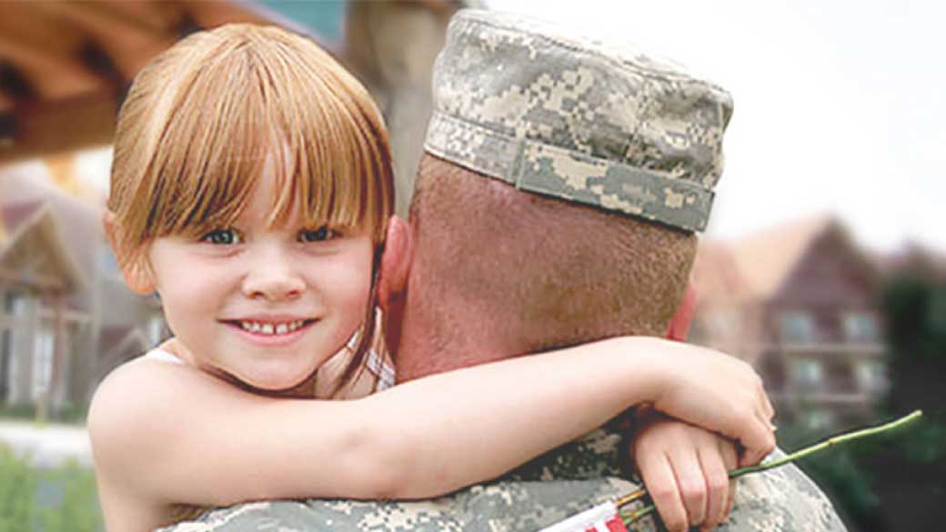 Hero soldier returns home to happy daughter