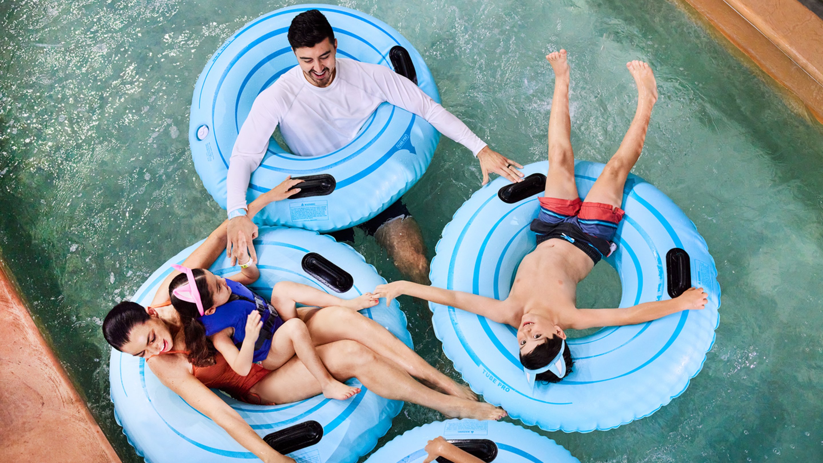 Family enjoying lazy river at Great Wolf Lodge