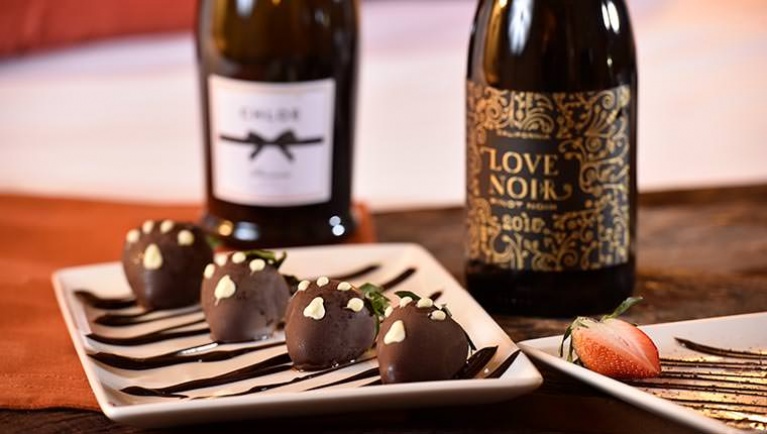 Chocolate covered strawberries and wine available at Great Wolf Lodge indoor water park and resort.