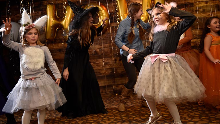 Kids at the Howl-O-ween themed dance party