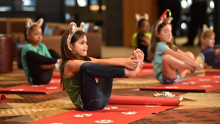 Children take part in a yoga class