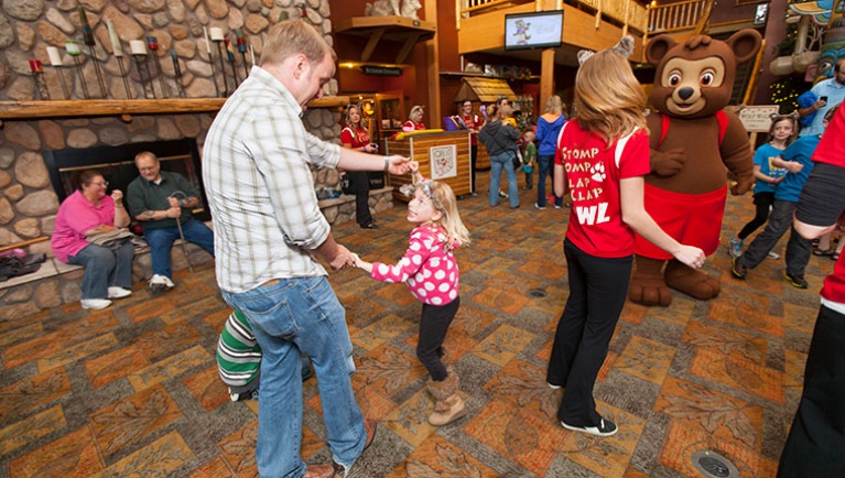 People dancing during the PJ Party at Great Wolf Lodge indoor water park and resort.