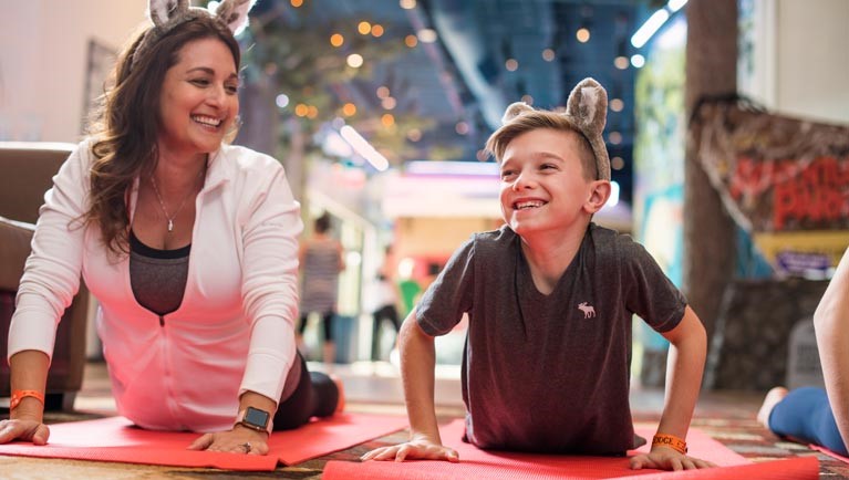 Mother and son doing Yoga