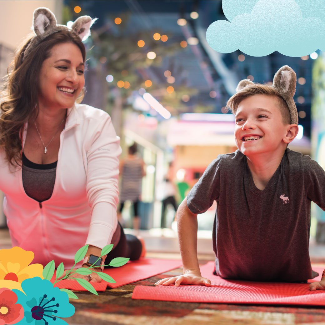 Two kids stretching during yoga activity