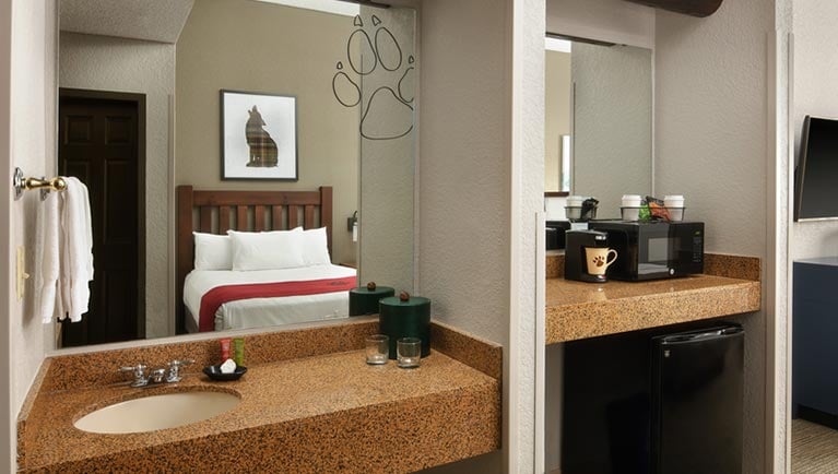 The sink area in the Wolf Den Suite with balcony