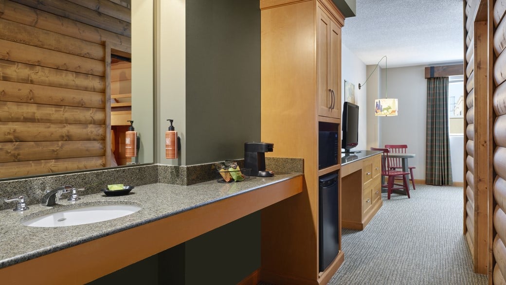 The sink area in the Queen Cabin Suite Waterpark Balcony