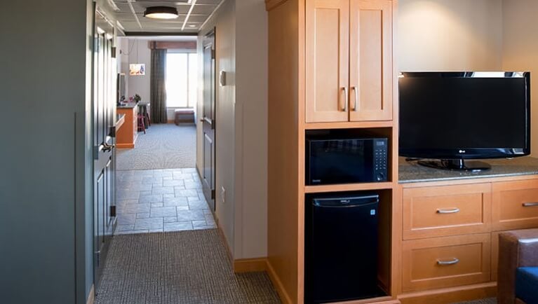 The hallway and mini-fridge in the Royal Family Suite (Standard)