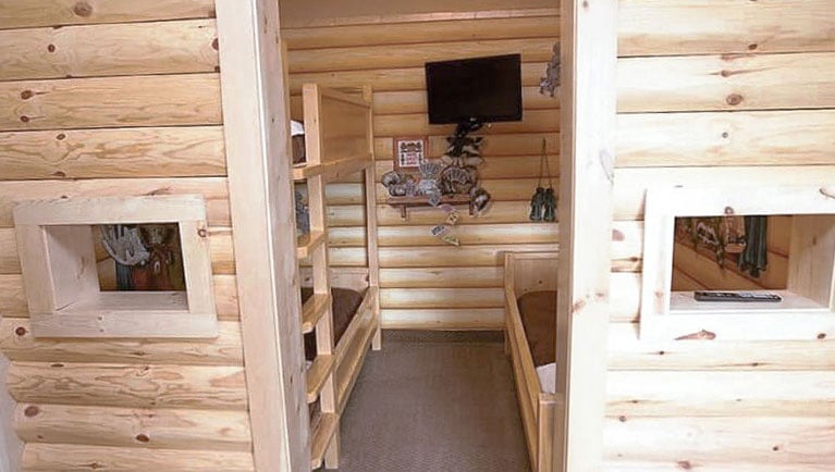 The bunk beds inside the cabin in the Accessible Bathtub Junior Cabin Suite