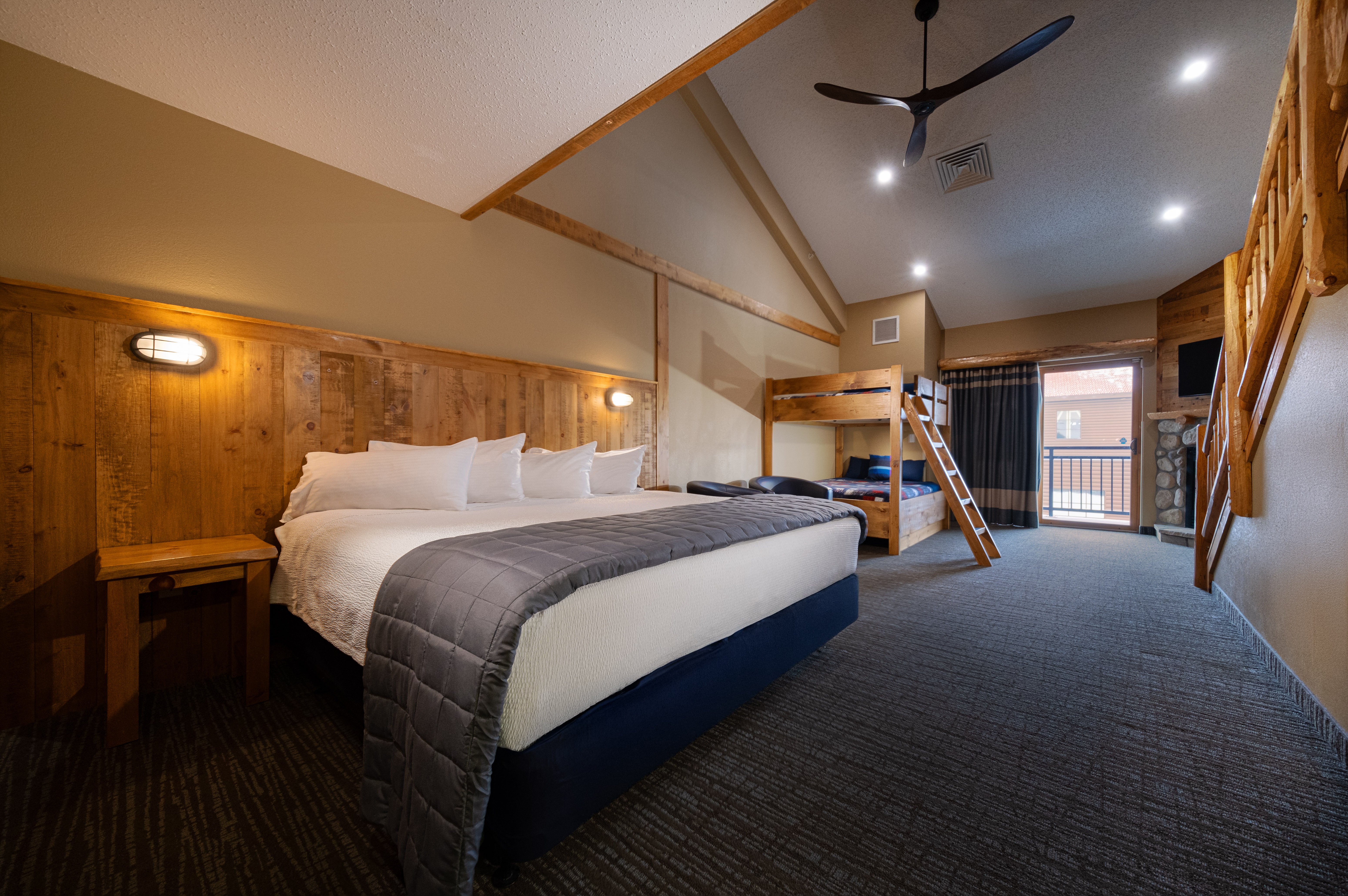 Bunk bed and king bed in Family Loft suite