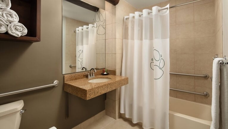 The bathroom in the accessible Whirlpool Fireplace Suite