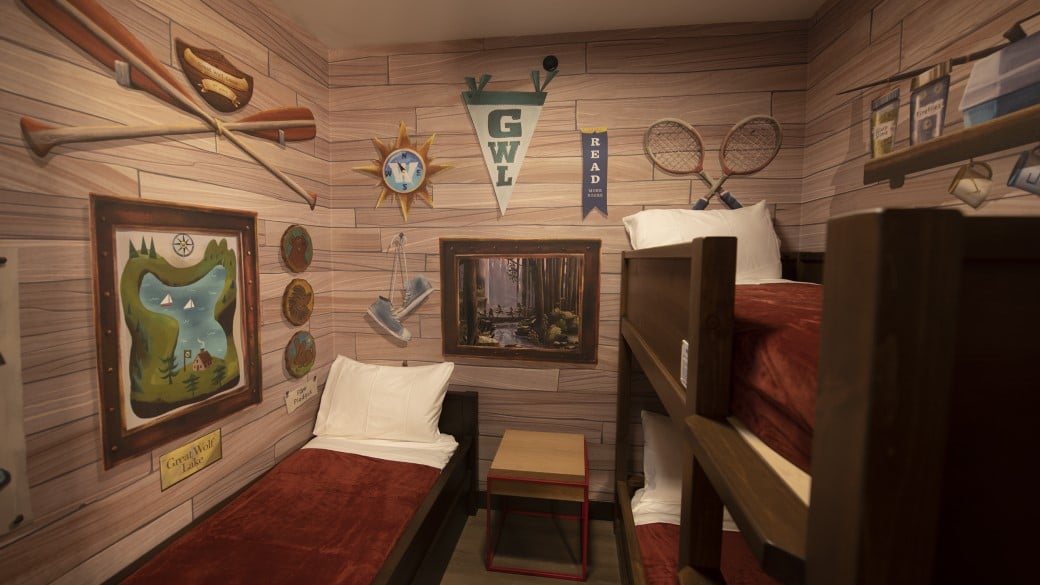 cabin themed room with bunk beds