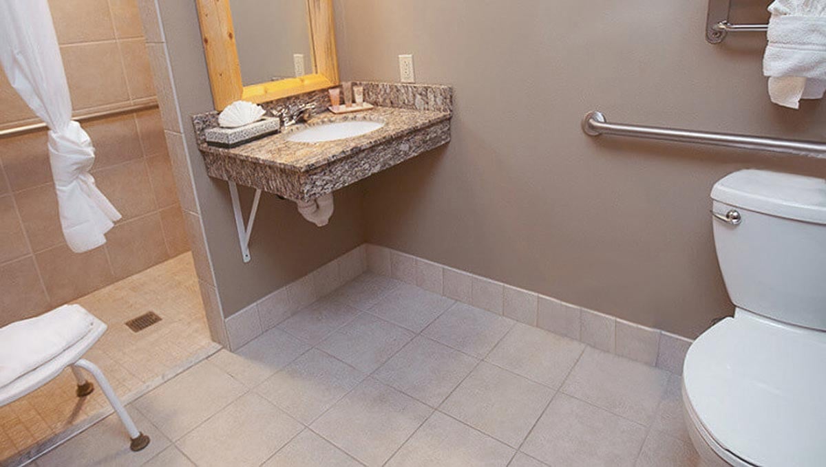 The sink area in the accessible Double Queen Suite