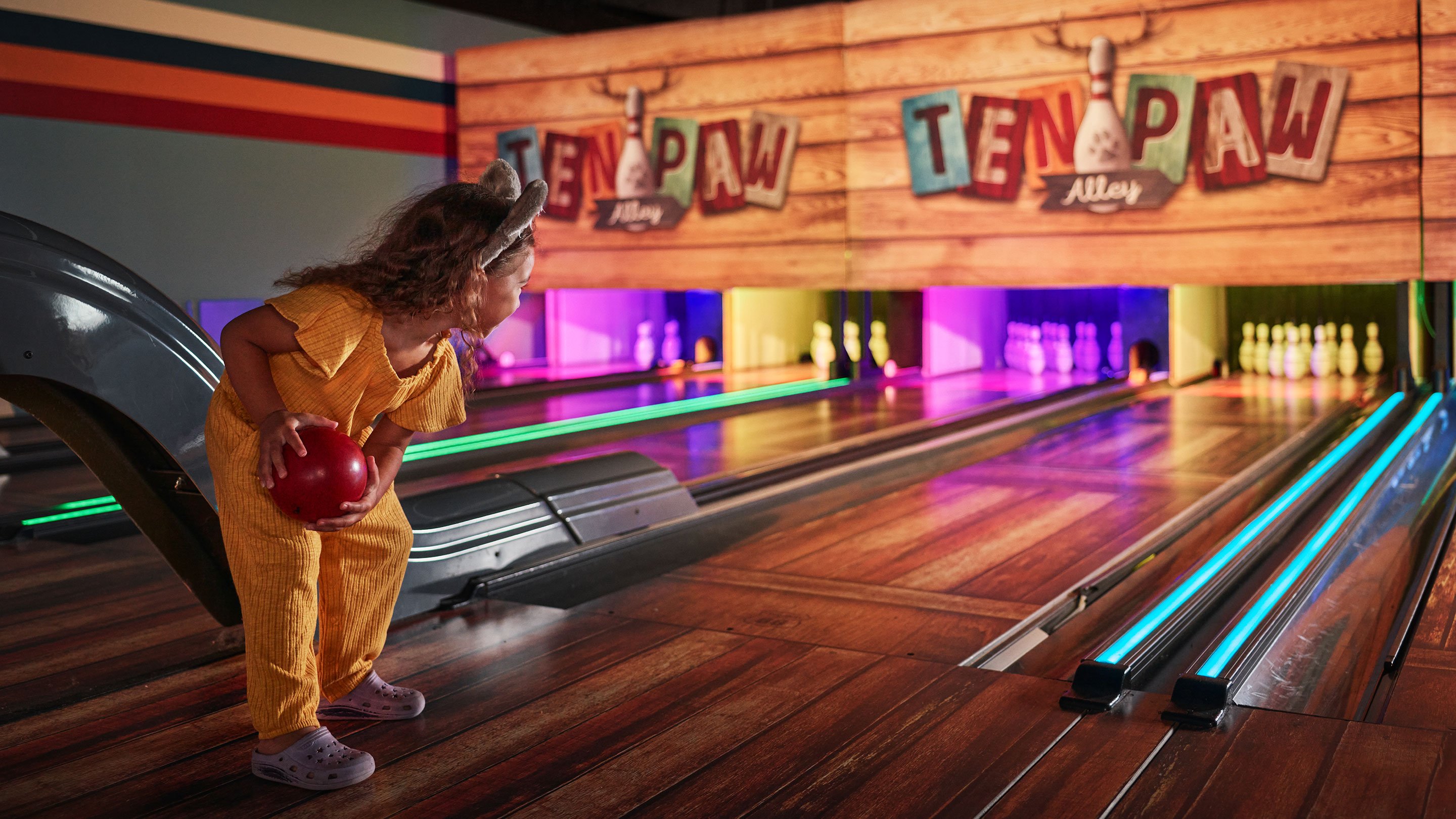 girl playing bowling