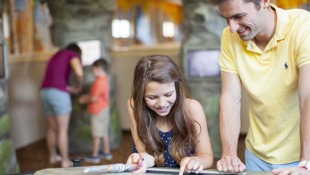 Girl enjoying with her dad at ShadowQuest