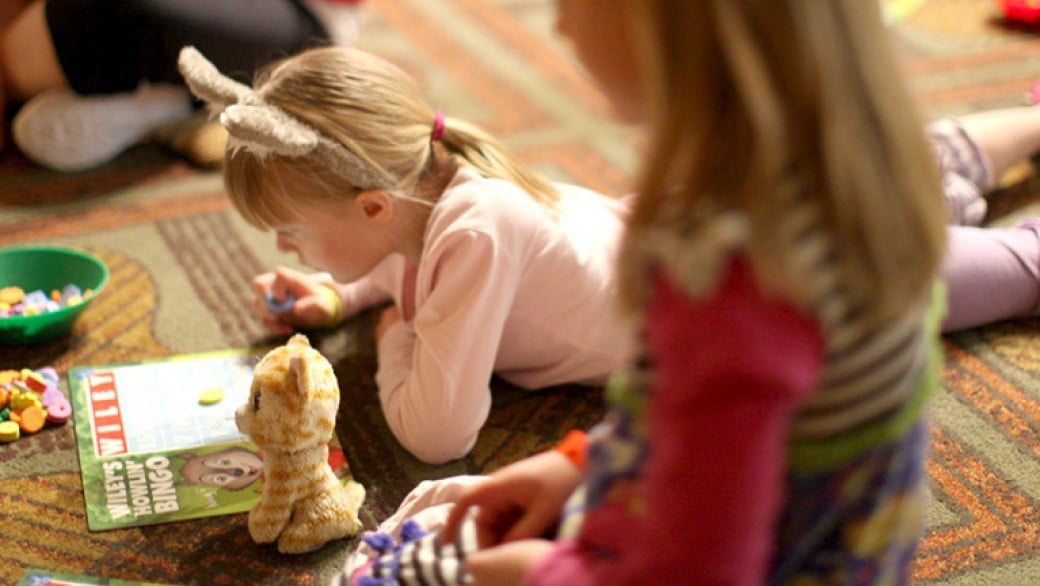 a girl wearing PJ playing game