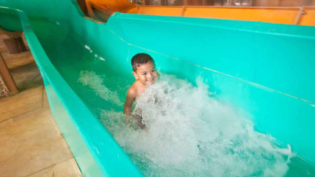 Happy Kid  at Beaver and Squirrel Falls at Great Wolf Lodge Niagara Falls, ON.