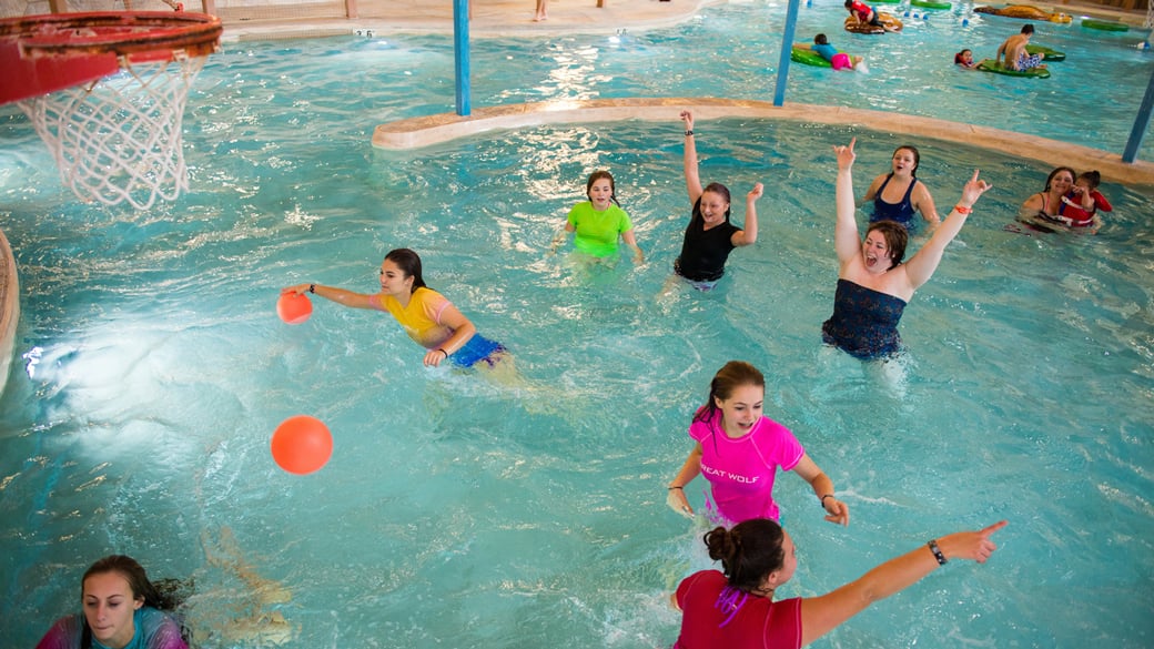 A two kids playing under water in Chinook Cove