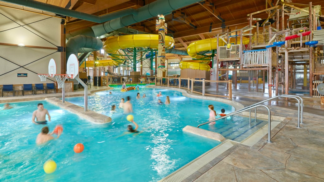 Kids playing in an indoor pool