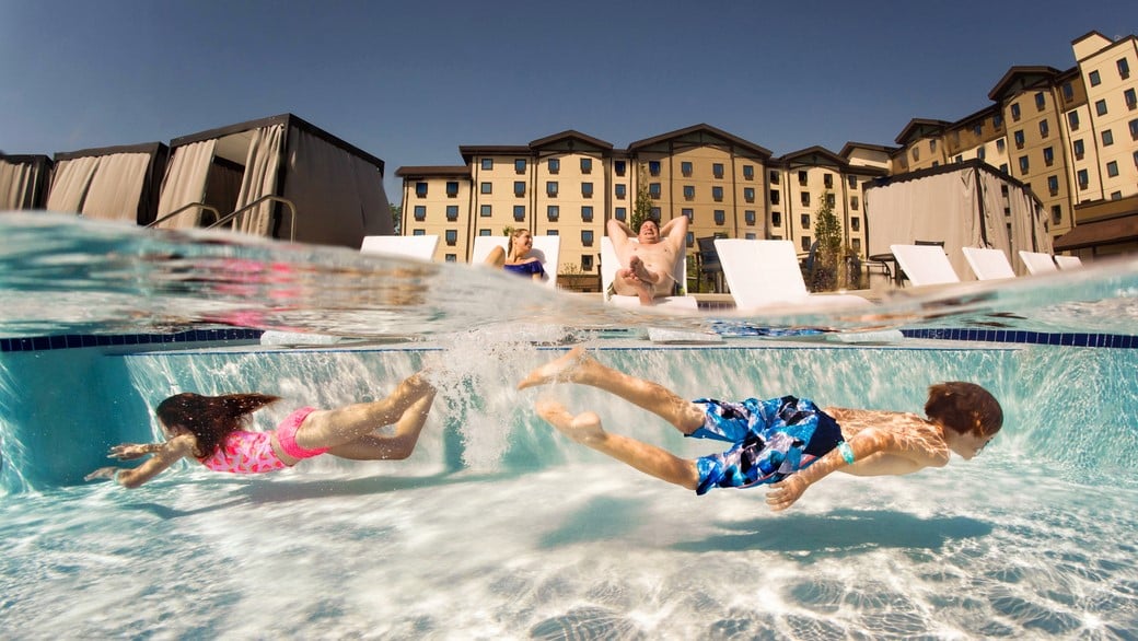 kids swimming under water