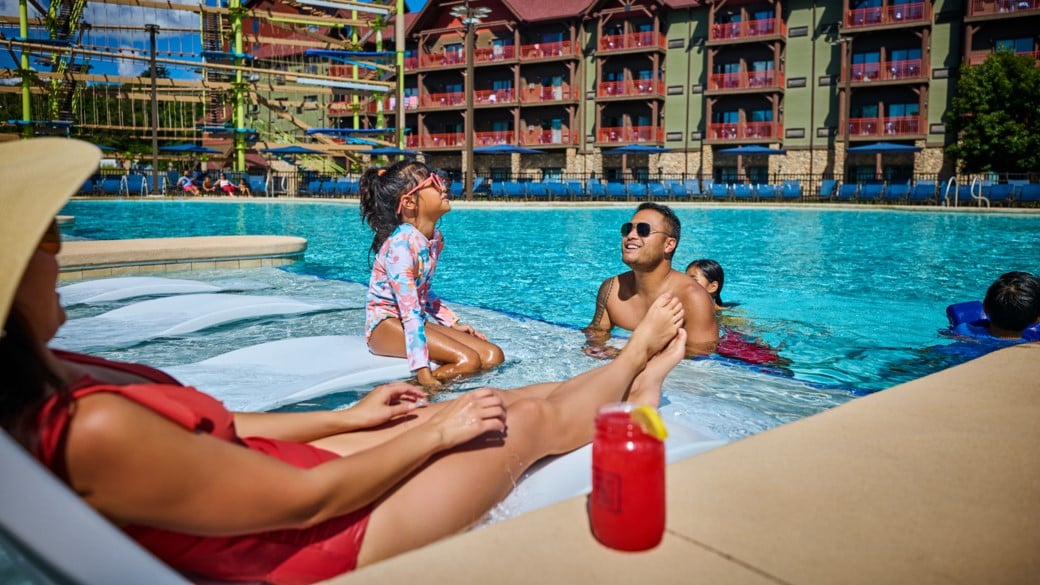 Family enjoying the outdoor pool